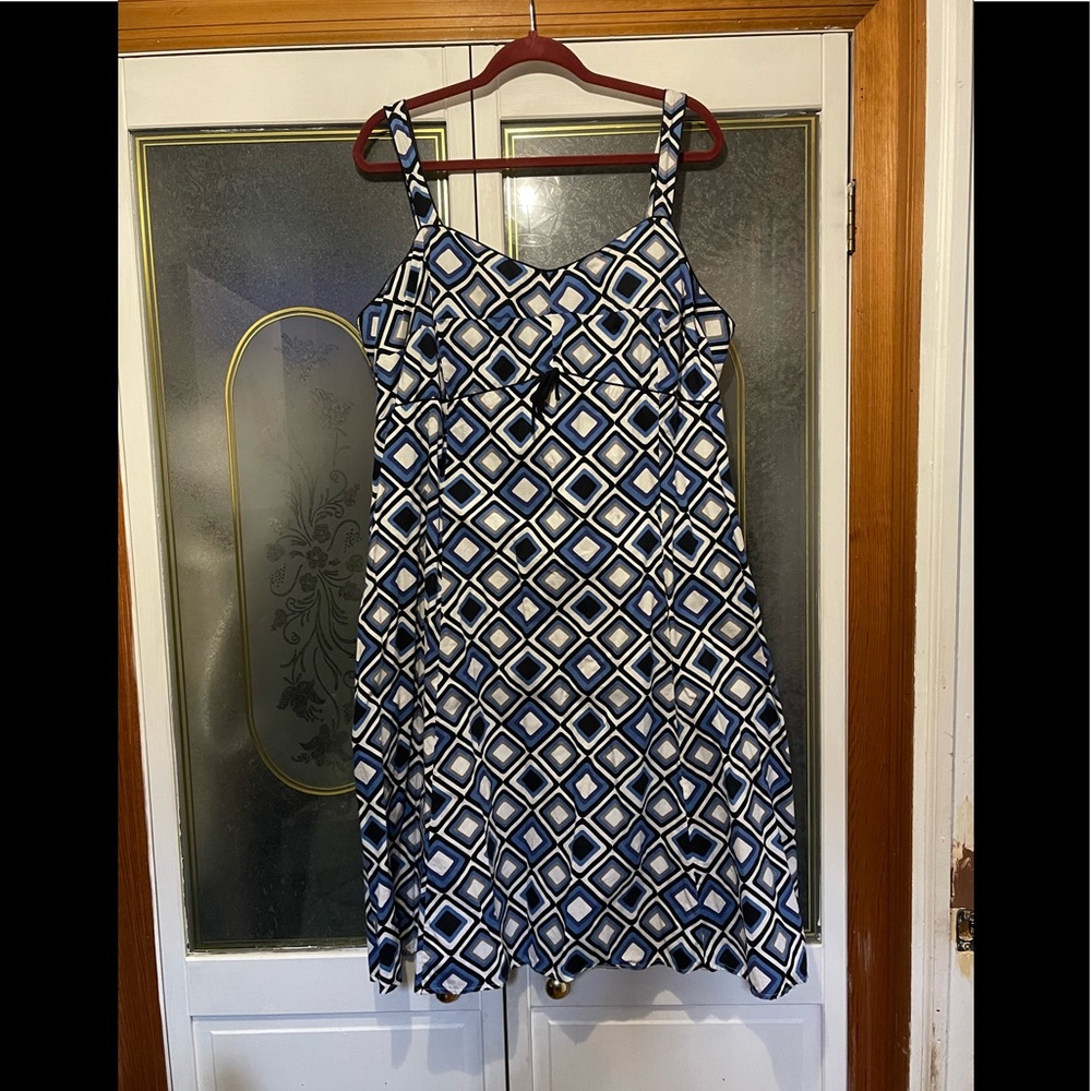Sundress. Smocked back with zipper for great fit. Size 22